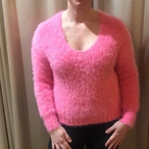 Bright pink fuzzy sweater